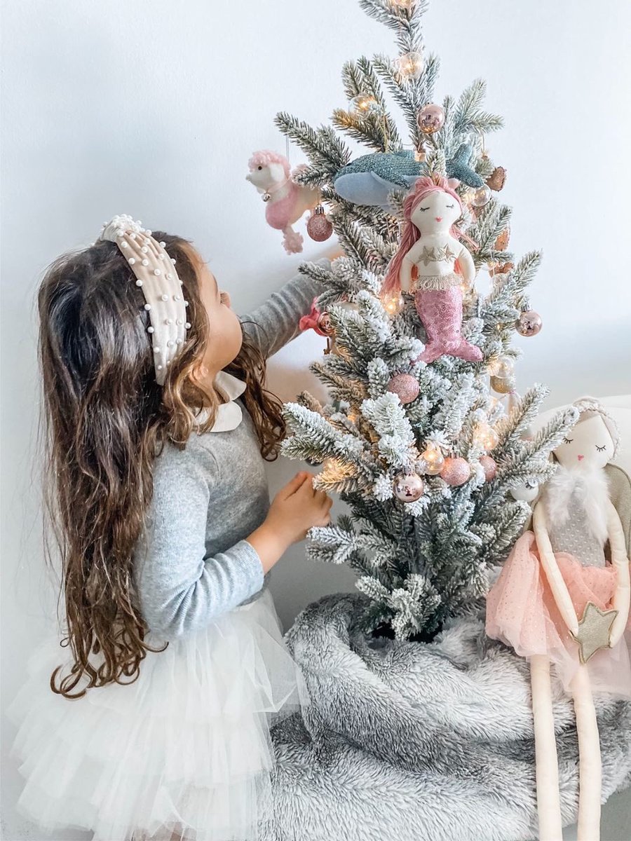 Who has a little tree just for the kiddies? One of our favorites 📸 in Miami. MON AMI sequin under the sea ornaments, and Anna the Pink Angel Heirloom Doll.  #lovemonami #sealifeornaments #mermaid #mermaidchristmas #ornaments #christmasdecor #christmastree #christmas