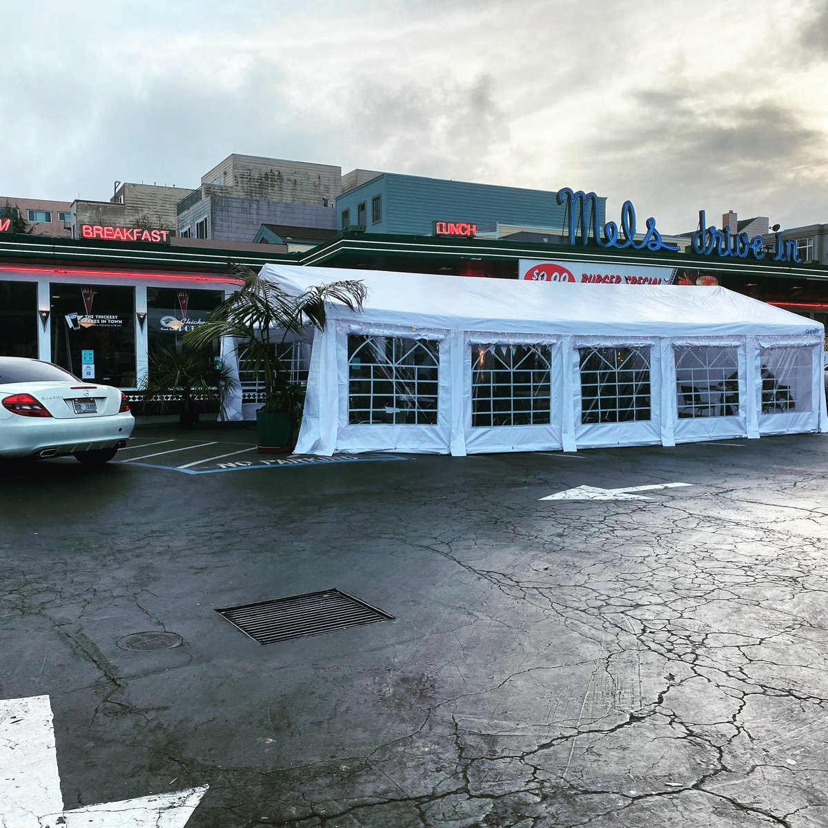 QueerlyQuiet's tweet photo. That... that’s a building... how is this indoors? Here’s one reason why CA has another stay at home order. 🤦🏻‍♂️ https://t.co/Z6j99dL92I