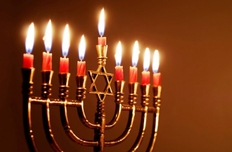 an additional candle is lit, so all eight are burning on the final night. Families and friends will often gather and recite traditional blessings or sing songs together as they light the menorah. The menorah we put next the window, where it was placed it in Talmudic times.