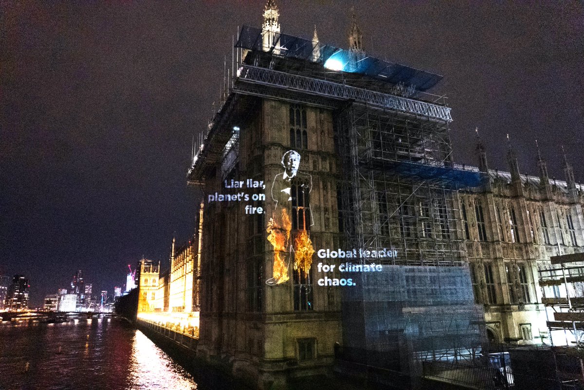 Projection onto the Houses of Parliament, London for @divestLondon in response to Boris Johnson’s climate target announcement. Photography: Lizzie

<a href="/WarOnWant/">War on Want</a> @COP26_Coalition #climatejustice <a href="/chilledasad100/">asad rehman</a> <a href="/tonybosworth/">Tony Bosworth</a> <a href="/Richard_Dixon/">Richard Dixon</a> <a href="/rjkennerley/">Rachel Kennerley</a> <a href="/ExtinctionR/">Extinction Rebellion Global</a>
