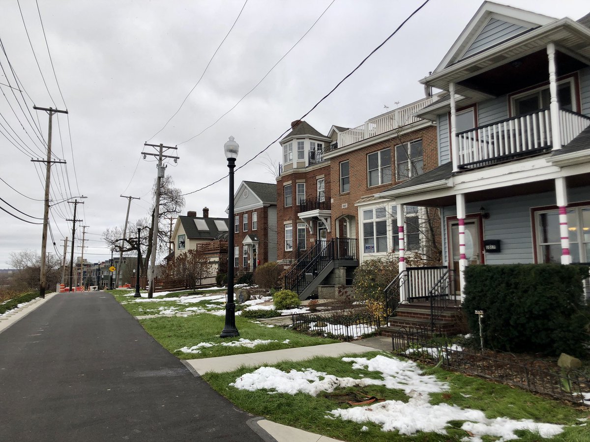 No, this isn’t just a regular repaved road with cars soon zipping by again. This is one of the last stages of the Towpath Trail, which has transformed this once car-dominated street into a car-free pedestrian and cyclist trail, along with the brand new Camp Cleveland park. (3/4)