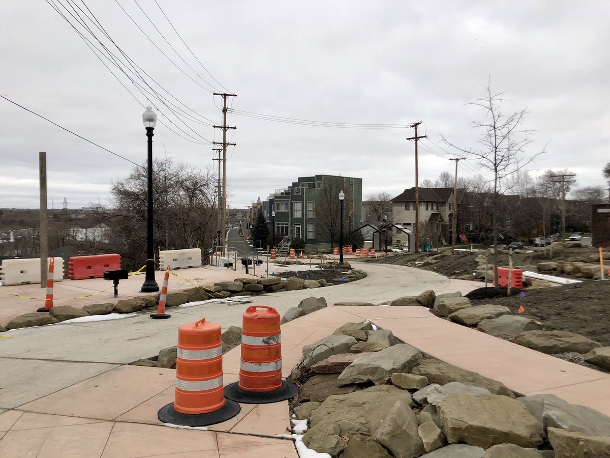 No, this isn’t just a regular repaved road with cars soon zipping by again. This is one of the last stages of the Towpath Trail, which has transformed this once car-dominated street into a car-free pedestrian and cyclist trail, along with the brand new Camp Cleveland park. (3/4)