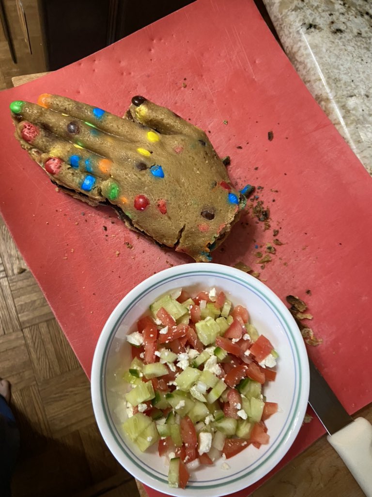 Take it out and freeze it! Gotta be cool and solid to demold. Chop up the Greek salad meanwhile. When it is solid remove from the mold, cut around the hand to remove the overhanging edges, fill with salad, cover with base, and you have the King’s Hand