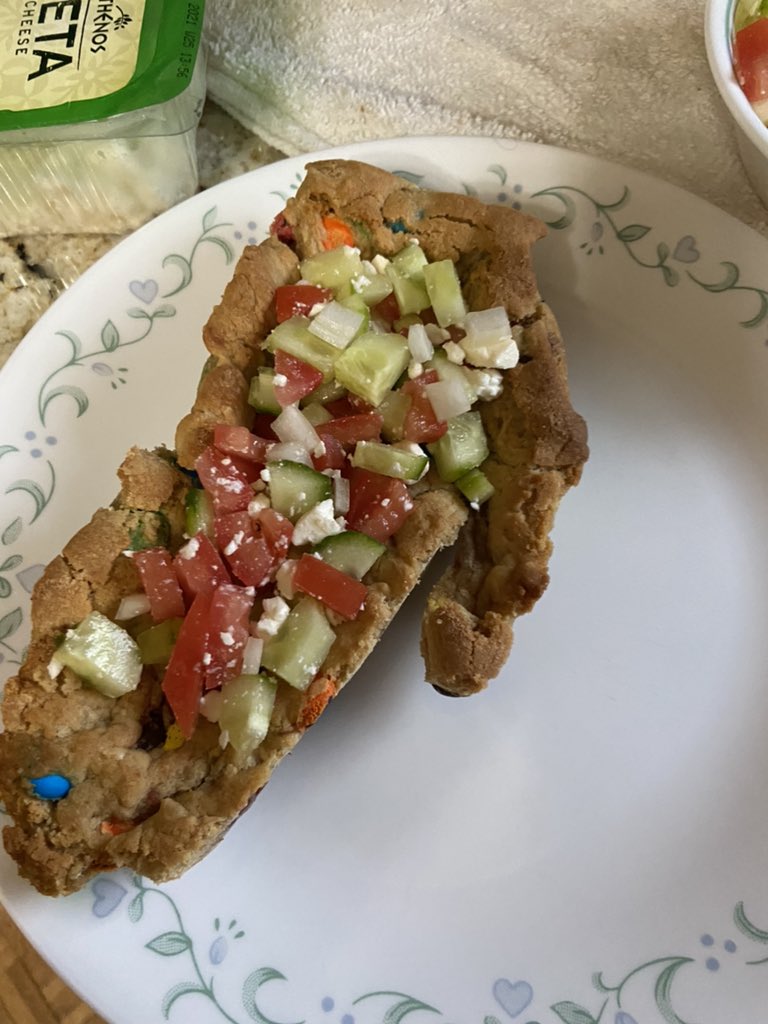 Take it out and freeze it! Gotta be cool and solid to demold. Chop up the Greek salad meanwhile. When it is solid remove from the mold, cut around the hand to remove the overhanging edges, fill with salad, cover with base, and you have the King’s Hand