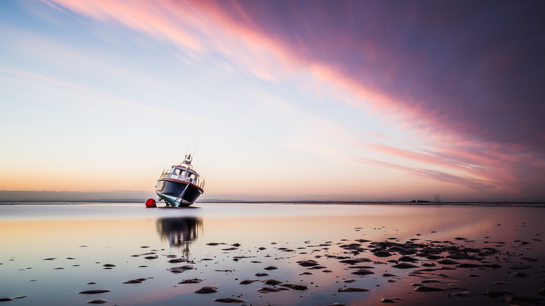 The Last Boat At First Light

This boat was on its own, the furthest out from the beach @ Shoebury Common, Essex.
#wexmondays 
#fsprintmonday
#appicoftheweek 
#sharemondays2020