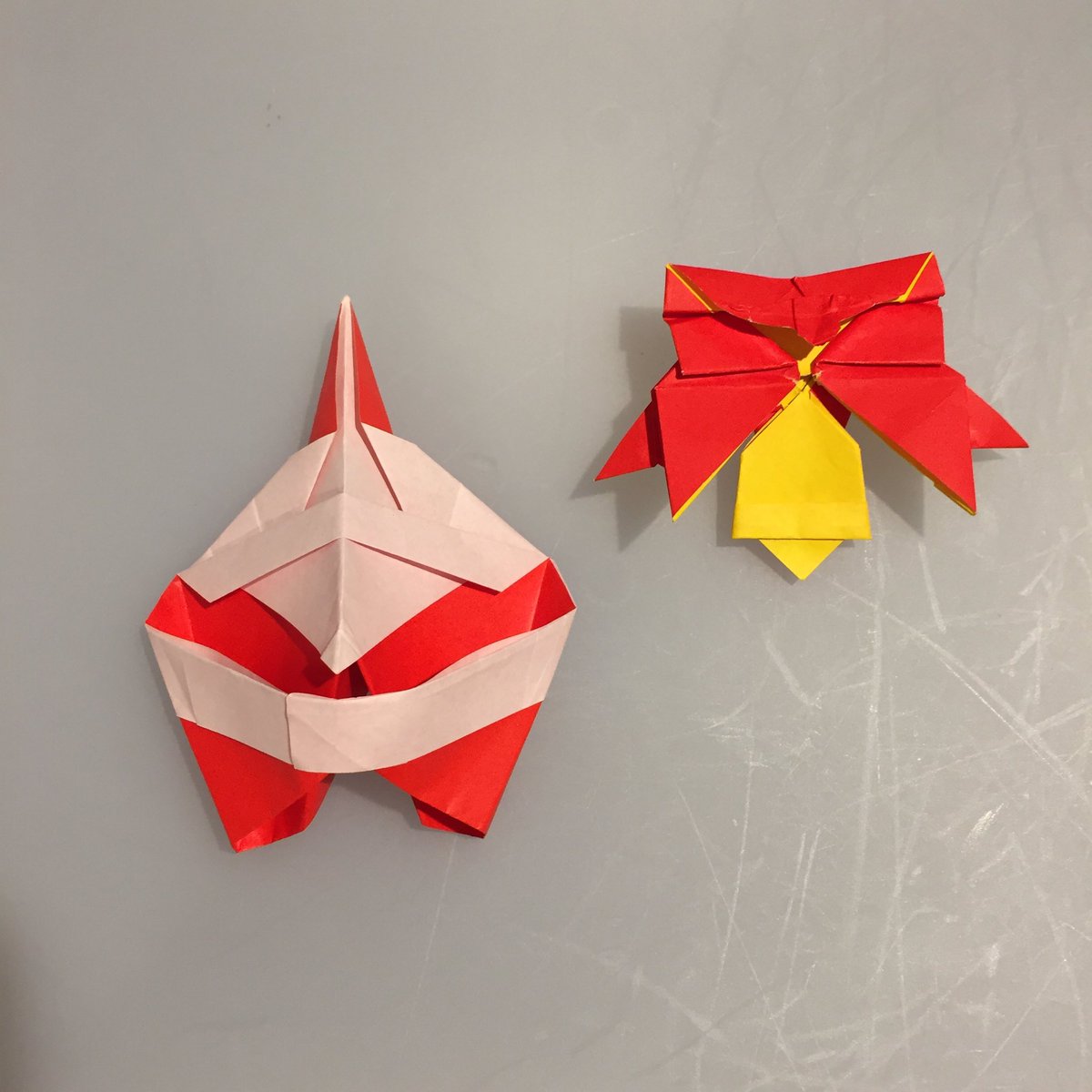 keikoinboston's tweet photo. Last #OrigaMIT meeting of the year today. Hideo Komatsu’s Santa and Takashi Hojyo’s Ribbon and Bell 2. Santa is not hard but I made some mistakes. The ribbon was pretty difficult! Need to try again. #origami https://t.co/KBlpxYHBMI