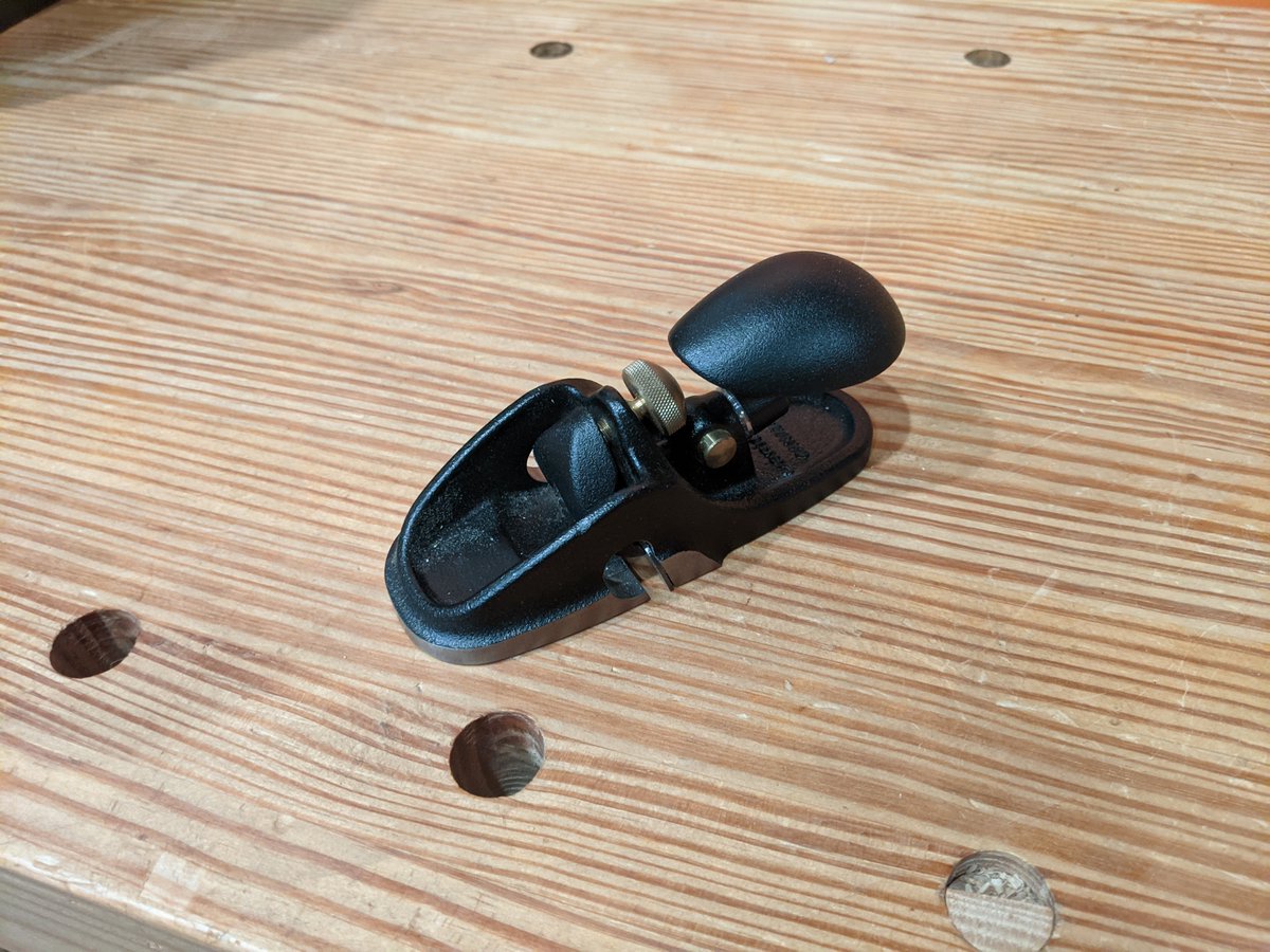 In the category of "I already owned it and there is currently spare room" is this Veritas Small Scraping Plane. Its a great little tool, but in no way is it necessary, the second I need the space it is gone.