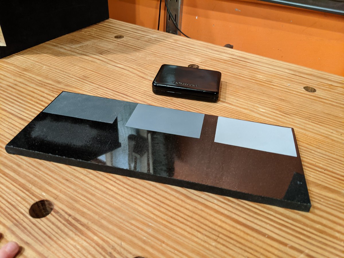 The black line in the upper right corner is this granite tile, on which PSA mylar-backed 3M sandpaper is adhered (the small black container holds extra sandpaper). This along with the MK2 honing guides is my sharpening system, which takes up very little space.