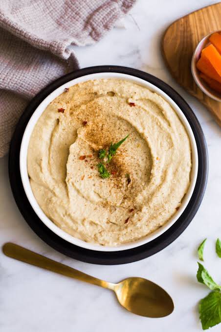 ——Hummus - 25 cals 1 tbspI VERY highly recommend you to make this yourself with little/no oil instead of buying it premade to avoid excess oil calories. (Or avoid buying anything premade in general whenever you can) And consume it in moderation.