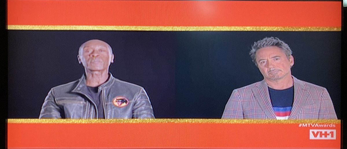 Don Cheade and Robert Downey Jr. in very simple black backgrounds can’t attend also. Note Cheade’s black panther patch