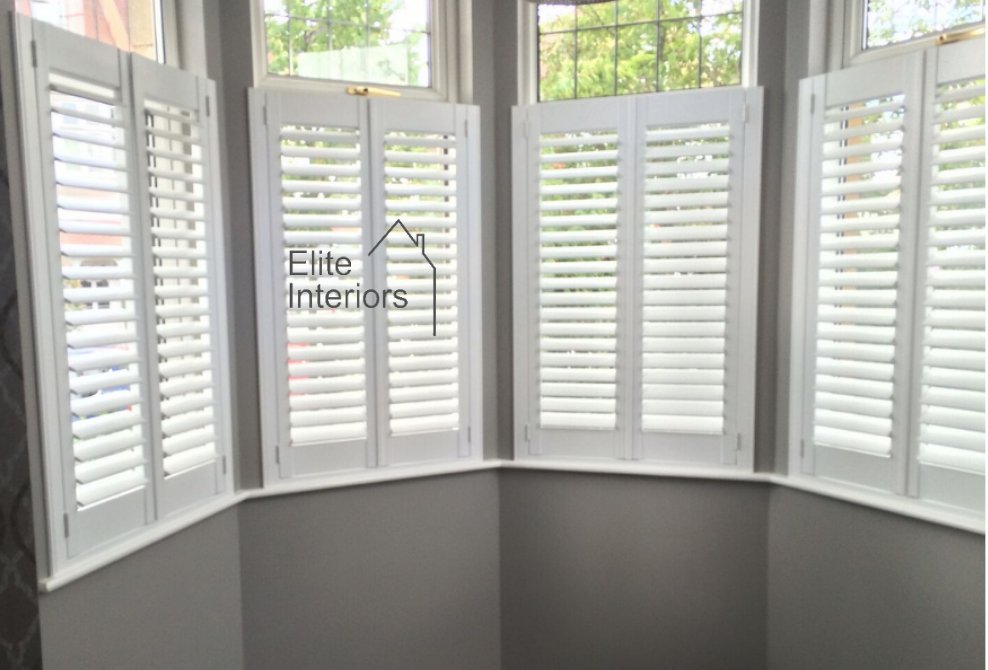 Eliteintslondon's tweet image. It is easy to see the high level of our expertise when we fit #BayWindowShutters the correct way because we use #BayPosts &amp;amp; #CornerPosts to give you a stronger &amp;amp; better #Shutter set. Beware of inexperienced #Fitters. See our Hardwood Plantation Shutters @ buff.ly/2KiMsid