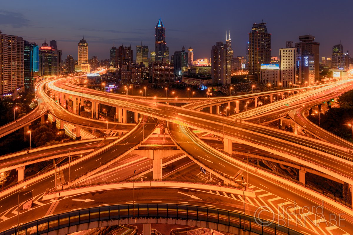 bernabephoto's tweet photo. "Entanglement" Shanghai by twilight with a web of highway overpasses weaving through the foreground. Shanghai, China #photography https://t.co/TI0RiHpI7s