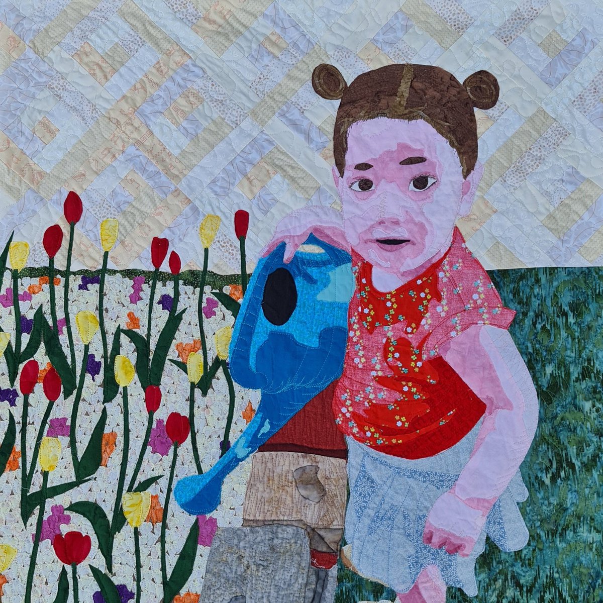 I finished #fabricportrait #quilt of my granddaughter. If you'd like to learn how to make one yourself, see my series of blog posts at quiltisrael.com/art-quilting-m…
