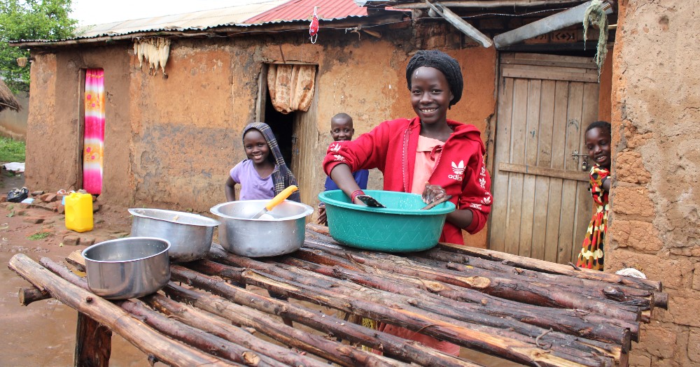 lovechildofhope's tweet photo. Our health/social workers are helping families find ways to improve hygiene/risk of infection. Judith (pictured doing chores) says she enjoys washing up after family meals. The wash stand means dishes dry in a more sanitary way &amp; allow her to be more comfortable. #slum #school https://t.co/73yfB4GAg3
