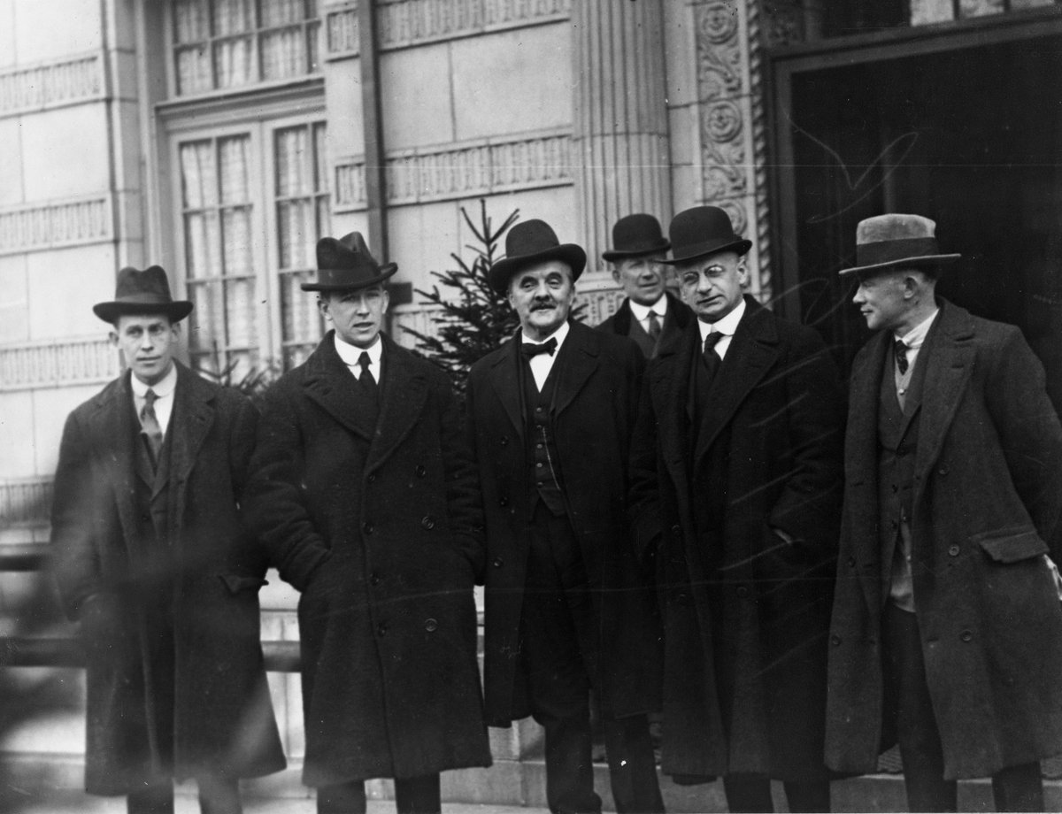 Having fled Cork as a stowaway on board a steamship, Donal O'Callaghan presented testimony about the  #BurningOfCork at the American Commission on Conditions in Ireland in Washington DC in January 1921. (O'Callaghan second on left in this picture outside the Commission).