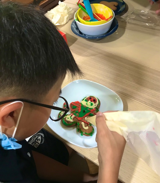 HHKSDarwin's tweet photo. A great atmosphere this evening as the #darwinians enjoy some mini table-top games and a gingerbread man decorating competition. #finalweekfun #darwinianchristmas @Harrow_HK @HeadHarrowHK https://t.co/NN2K1v1j5V