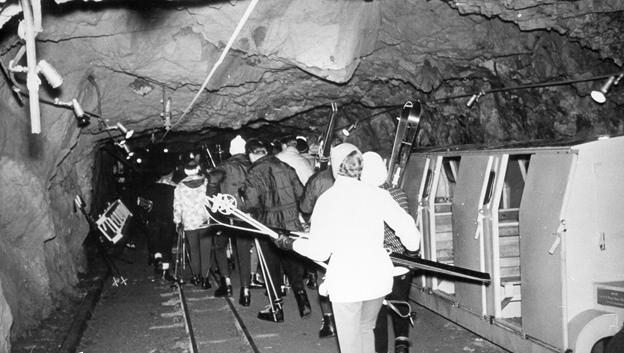 Skiing started as miners would ski jump on the old Creole mine dump (sounds lit)Park City Consolidated Mines officially began the ski business in 1963 on "Treasure Mountain"A mine train took them THROUGH the mountain to an elevator climbing up 1,750 ft (again, also sorta lit)