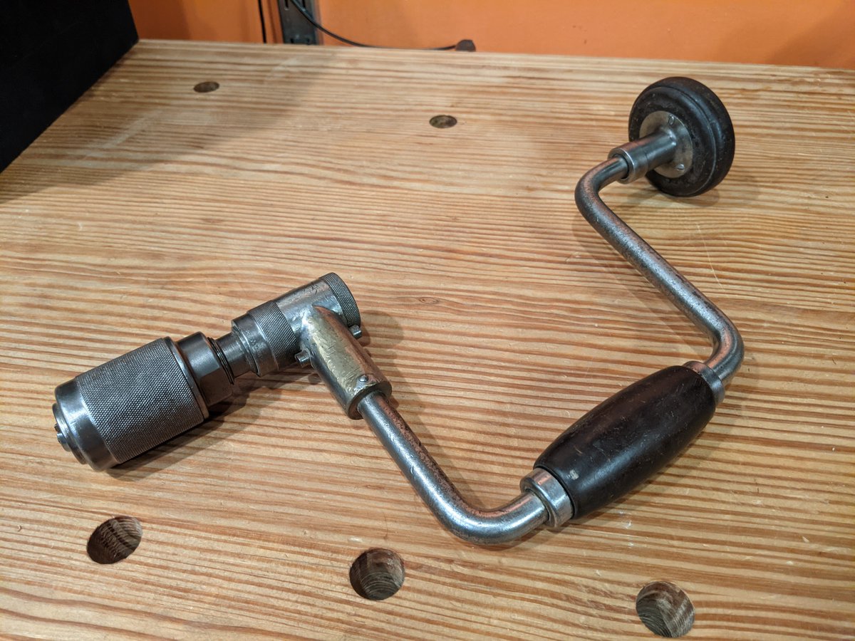 North Brothers "Yankee" 10" ratcheting brace. For use with the wood owl auger bits. An excellent tool that is only somewhat less awkward to store than the eggbeater drill above.