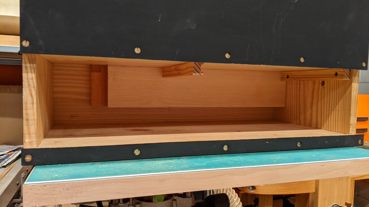 Here's an empty view of the lower compartment. You can see the addition I made on the left, it corresponds with the location of the modeler's rasp in the upper compartment.The rails for storing my sharpening tile were a later addition as well.
