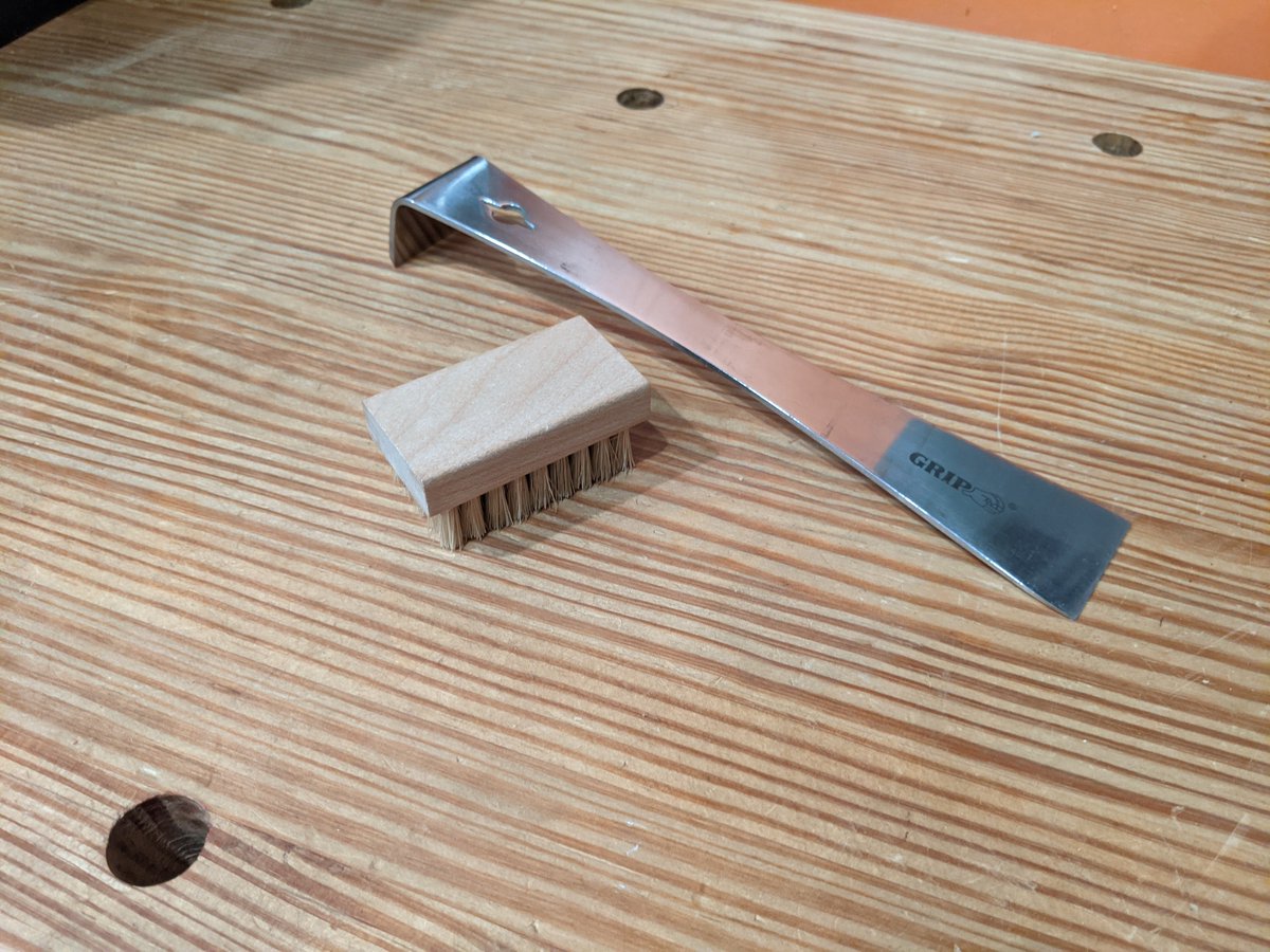 Remaining odds and ends, a thin prybar for disassembly and a file brush for cleaning my rasps.The pry bar is stored so deep in the chest as to be useless, I always fish the copy out from my home repair toolbox instead of digging for this one.