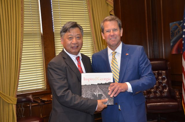 6. After the meeting, Governor Brian Kemp personally wrote a message on the title page of the book and presented "Inspired Georgia" to Chinese Consul General Li Qiangmin.  https://archive.is/lHhKa#selection-875.1-877.81