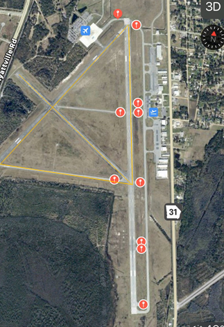 The points on this map represent the areas of the runway that show the number 17 & 35.17-35 on the left and the right is mirrored to read 35-17. I’m not sure if this is common, but I thought it was worth mentioning. Also note the design and what looks like an arrow pointing SE.