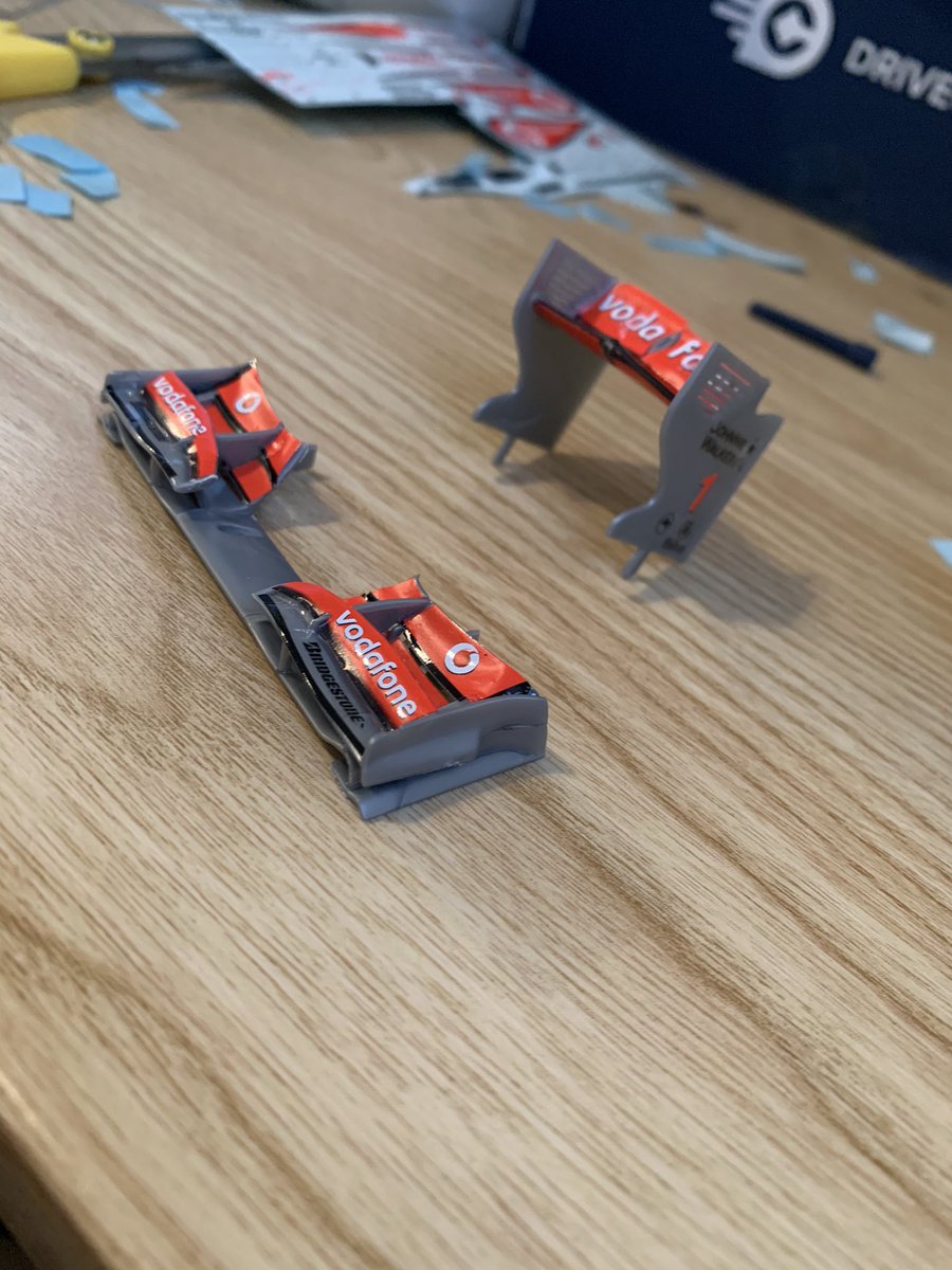 Joined up the chassis. Added the decals on the front and rear wings and attached it to the car  #Mclaaren  #Revell