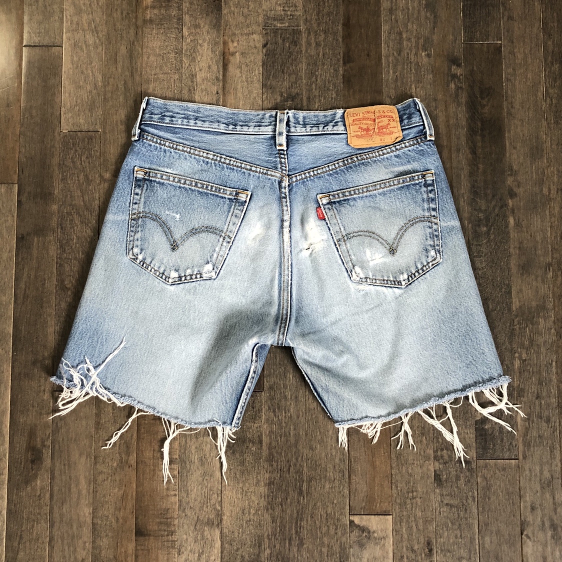 Number 49Cut-off Levis. Usually when the legs had been patched beyond repair. No half measures - they either looked brilliant or tragic. "You've got two long, white threads hanging down from your shorts".