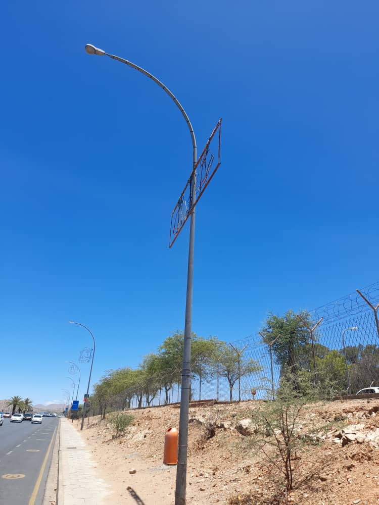 Shipululo's tweet photo. After 30 Years, Children in Katutura can now also see the Christmas Lights. Parents no longer have to drive their kids  to TOWN for Christmas Lights. We must end Elite Privileges in our City. Keep your head up as you hear and be heard! https://t.co/XiQS7Zxc3v