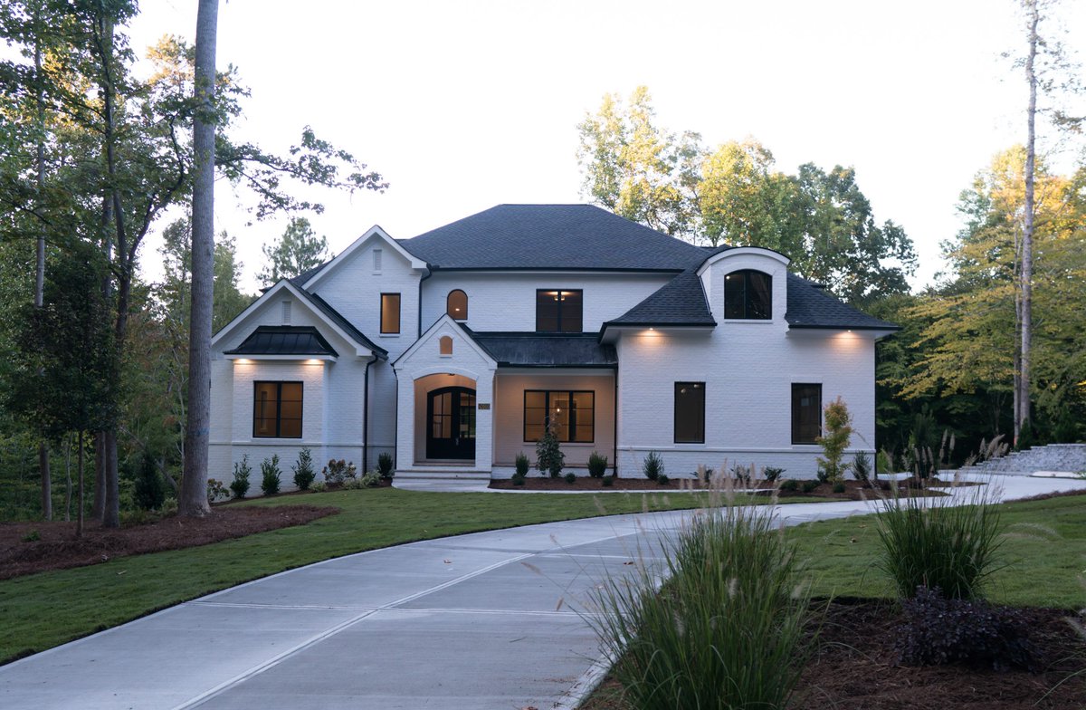 Traditional brick or painted brick? Let us know in the comments which exterior you would prefer for your custom home! Check out these homes and others like them on our website by clicking the link below: buildboldnc.com/gallery/