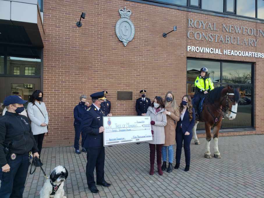 RNC_PoliceNL's tweet photo. .@ChiefJoeBoland presented a donation in memory of the late Chief Robert Johnston to the @HealthCareFdn on behalf of the RNC and its members today. It was an honour to have Ms. Gloria Johnston, & Robert’s daughters, Sarah and Amanda, accept the donation to the #TreeOfMemories. https://t.co/aK5YhaXiv1