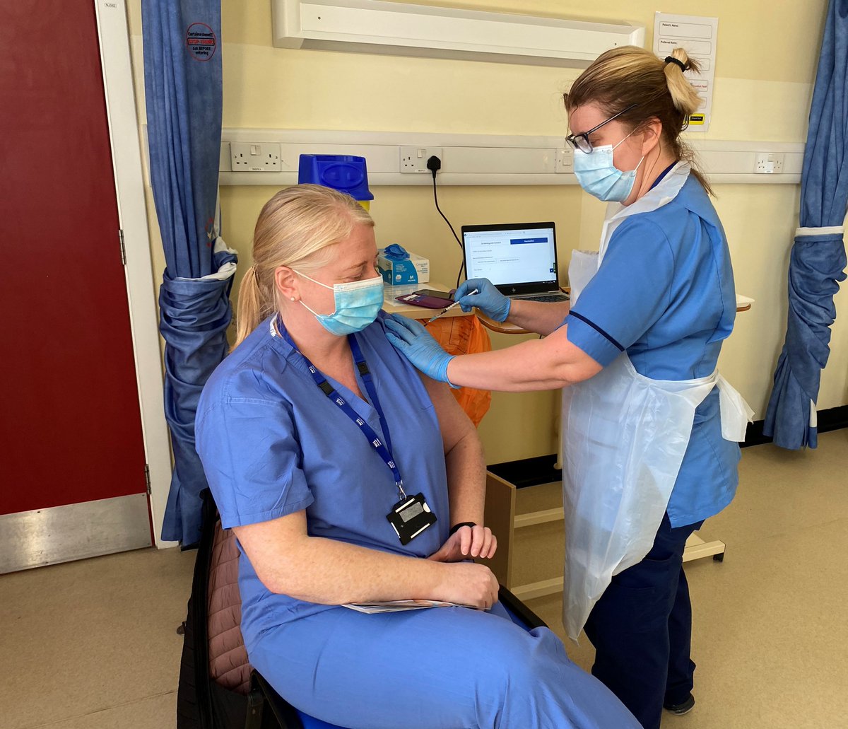 NHSLanarkshire's tweet photo. Delivery of the eagerly-awaited covid-19 vaccine has started in Lanarkshire. The first two recipients were Dr Karen Gray and Andrew Stewart from University Hospital Hairmyres. Also vaccinated today were staff from the Emergency Department and care of the elderly. https://t.co/Uu2CFMiNgF