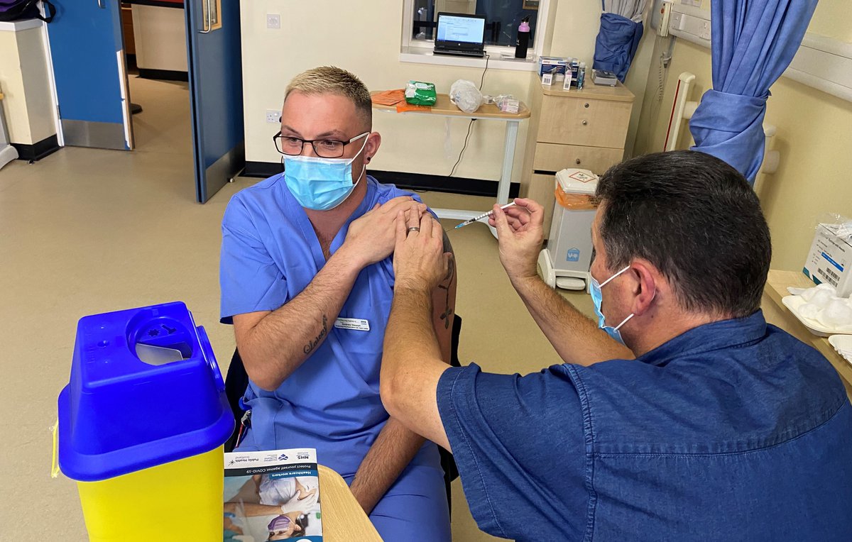 NHSLanarkshire's tweet photo. Delivery of the eagerly-awaited covid-19 vaccine has started in Lanarkshire. The first two recipients were Dr Karen Gray and Andrew Stewart from University Hospital Hairmyres. Also vaccinated today were staff from the Emergency Department and care of the elderly. https://t.co/Uu2CFMiNgF