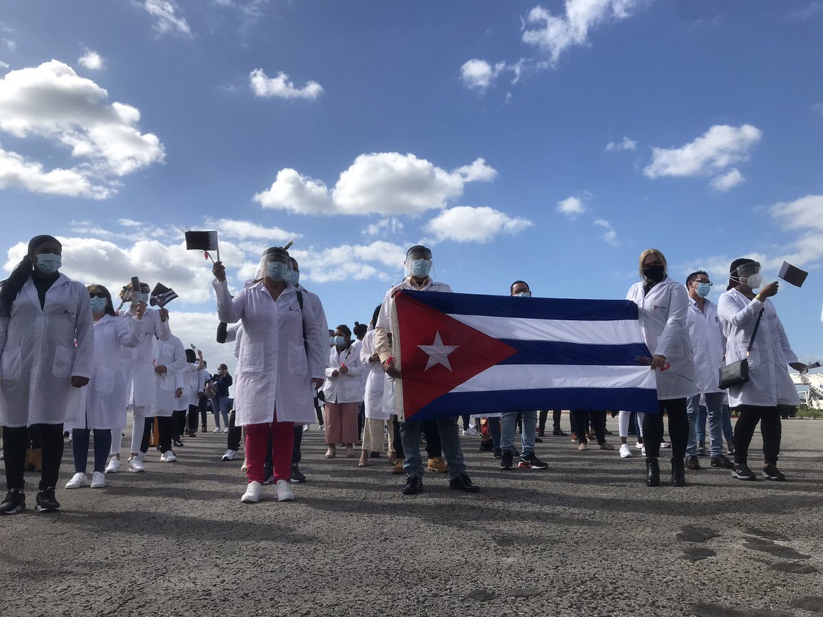MINSAPCuba's tweet photo. Regresa a la Patria, la #BrigadaHenryReeve que enfrentó la #COVID19 en #Qatar. El presidente los recibió de forma virtual, asegurándoles que se encontrarían al terminar el periodo de cuarentena: “Recibimos a la Brigada de Qatar, que de forma ejemplar cumplió su labor”, expresó. https://t.co/lo965WKR9y