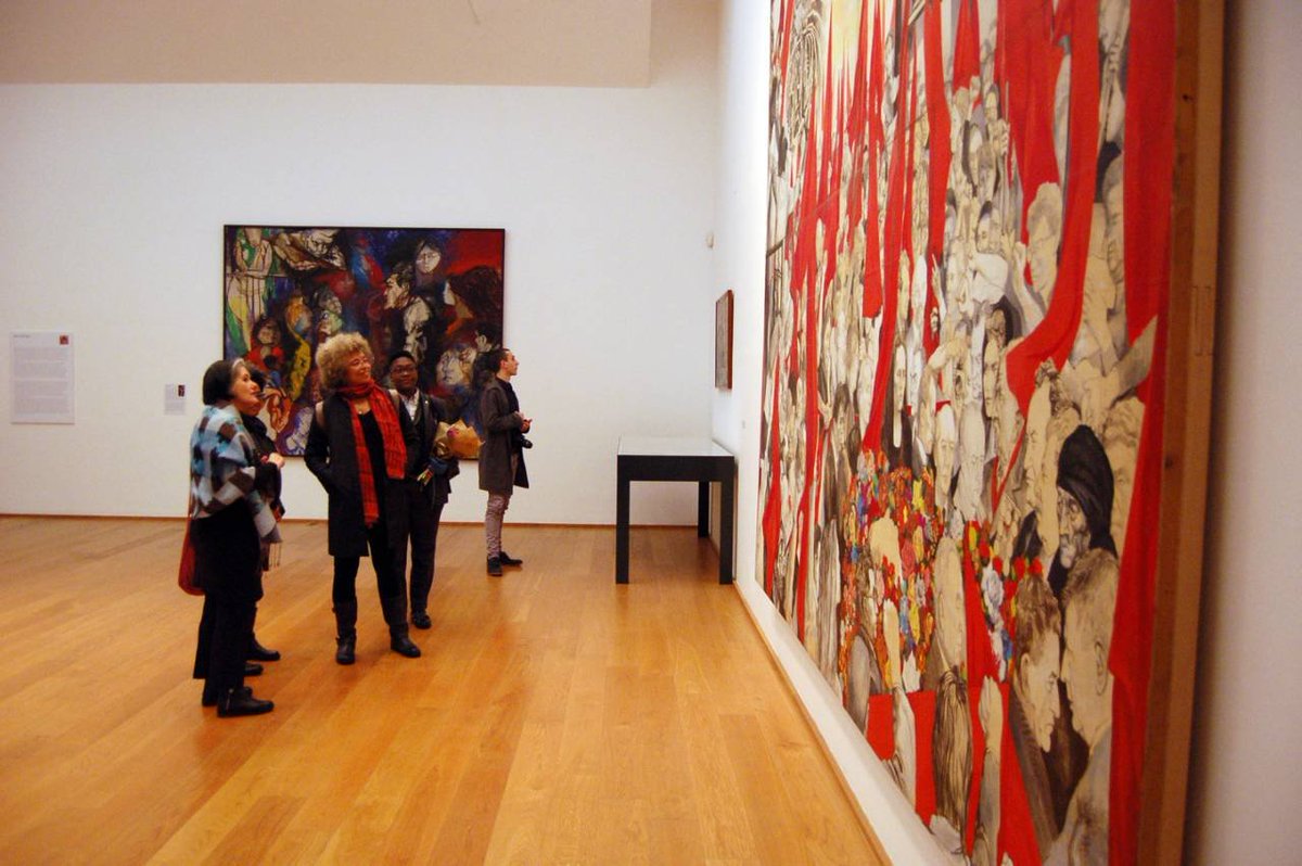 Angela Davis visited the Museo d'Arte Moderna in Bologna in March 2016 to contemplate this allegorical piece where she is represented along with Beauvoir, Gramsci, Pasolini, Vittorini, Benjamin, Brezhnev, Lenin, Marx, or Gattuso himself. Images ©ANSA.