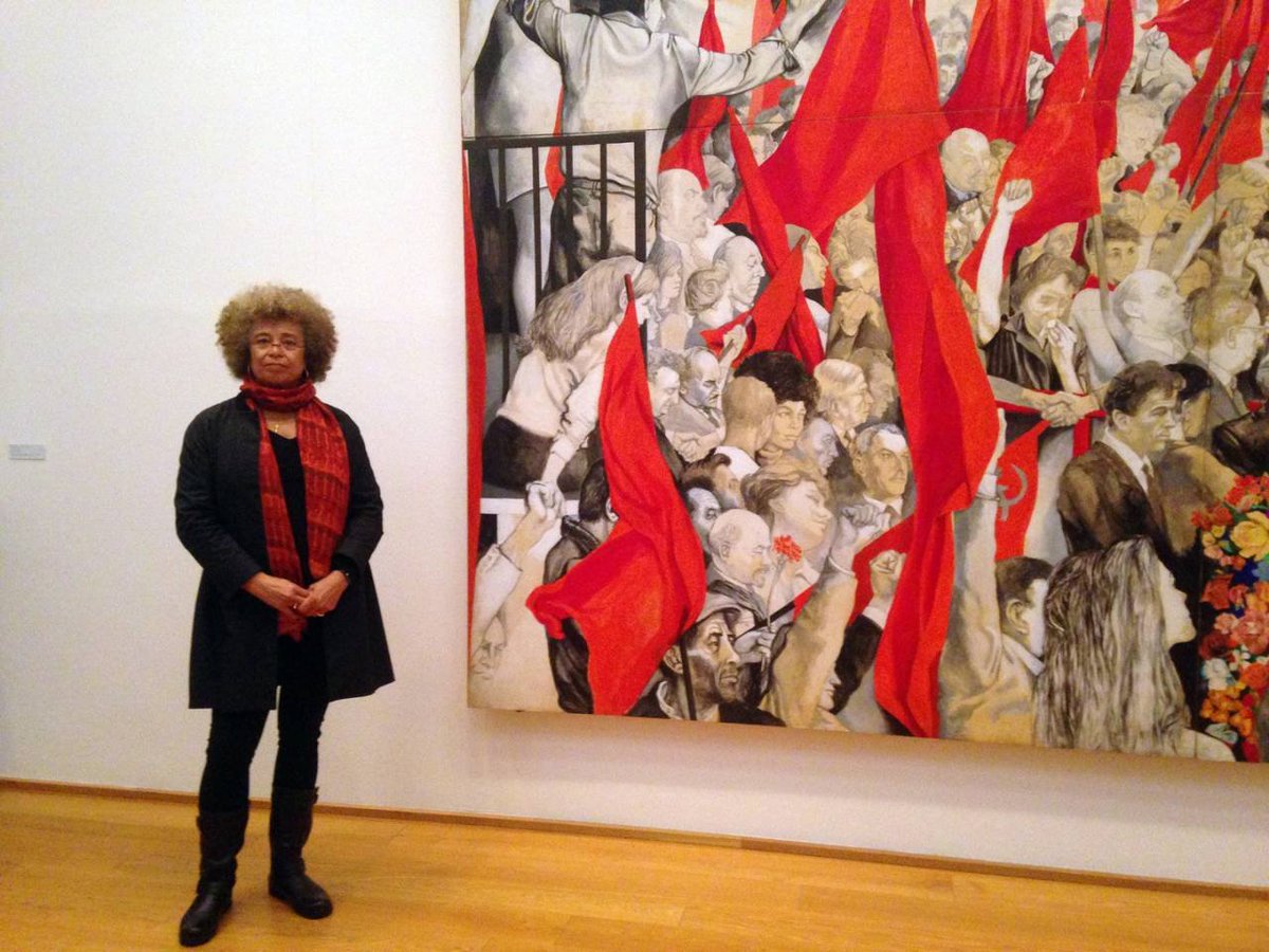 Angela Davis visited the Museo d'Arte Moderna in Bologna in March 2016 to contemplate this allegorical piece where she is represented along with Beauvoir, Gramsci, Pasolini, Vittorini, Benjamin, Brezhnev, Lenin, Marx, or Gattuso himself. Images ©ANSA.