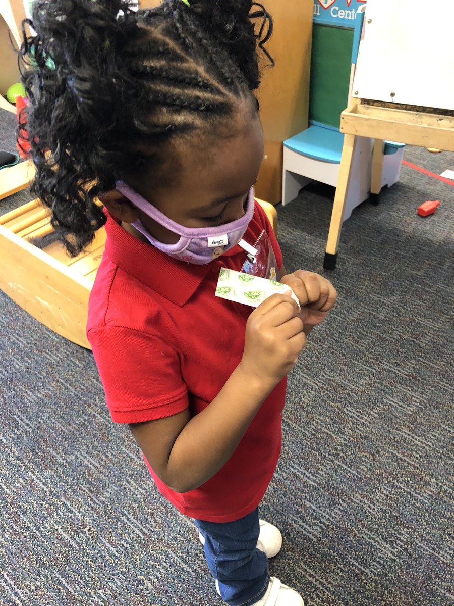 Faby__Vidal's tweet photo. What you see is cardboard & bandaids. What they see, is a place to stick their bandaids after theyโve learned to peel them open! Working on fine motor skills in a simple & fun way! Did I mention itโs tied to the theme of Safe & Healthy Me! #imaginationlab @DobiePKSchool https://t.co/ib66hwomD4