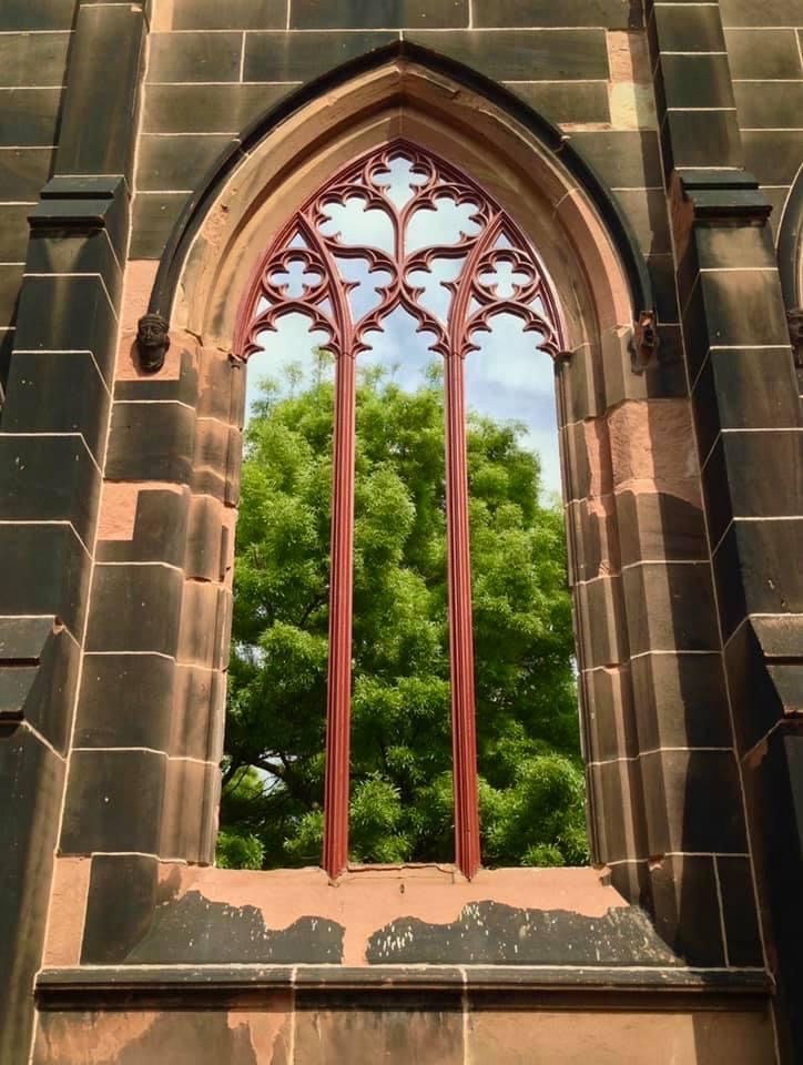 Day 195 IMAGE A DAY of Birkenhead Priory. A view through one of the cast iron windows in the facade of St Mary’s church on the Priory site. St Mary’s was designed by Thomas Rickman, one of the leading church architects of his day and opened in 1822. Demolished in 1977. Photo SH.