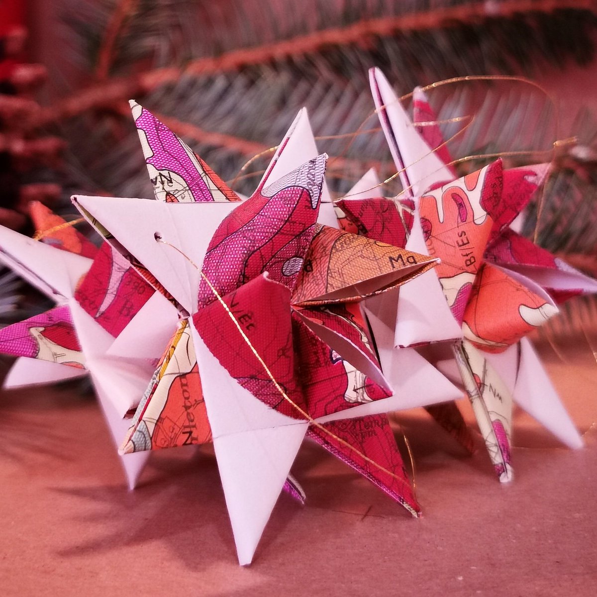 emmalucycole's tweet photo. Please RT! 
Only 10 days left to order your one-of-a-kind Vintage Map Stars in time for Xmas! 
Handmade from maps dating back as far as 1902, in a gift bag, with a personalised message. 
A unique addition to the Xmas tree for anyone who loves travel.
https://t.co/hLnY3R91PQ https://t.co/dOzCPo3tDv