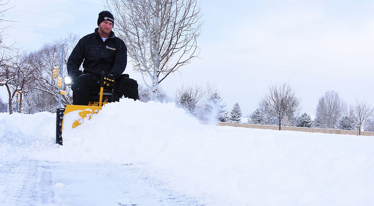 Handle snow with ease using the 48" Dozer Blade. Developed to provide a durable, simple, and productive design, this Dozer Blade quickly attaches onto your Walker Mower - meaning you're ready when the snow comes. Learn more at Walker.com - walker.com/addons/a32