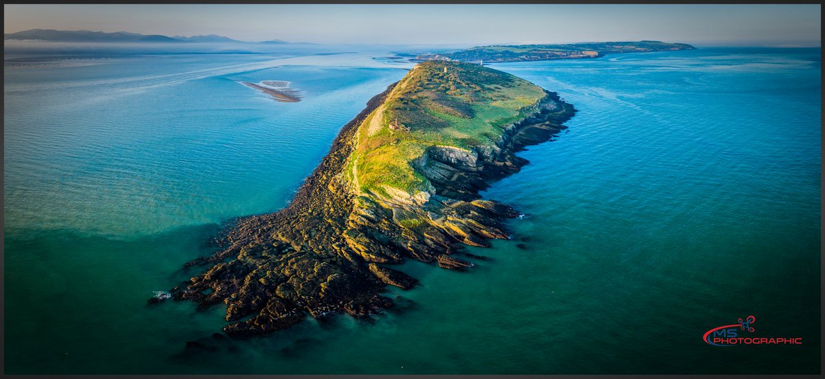 Puffin the island located just of the beautiful shore of Anglesey. You can even see some seal relaxing 
#Anglesey #dronephotography  #puffinisland