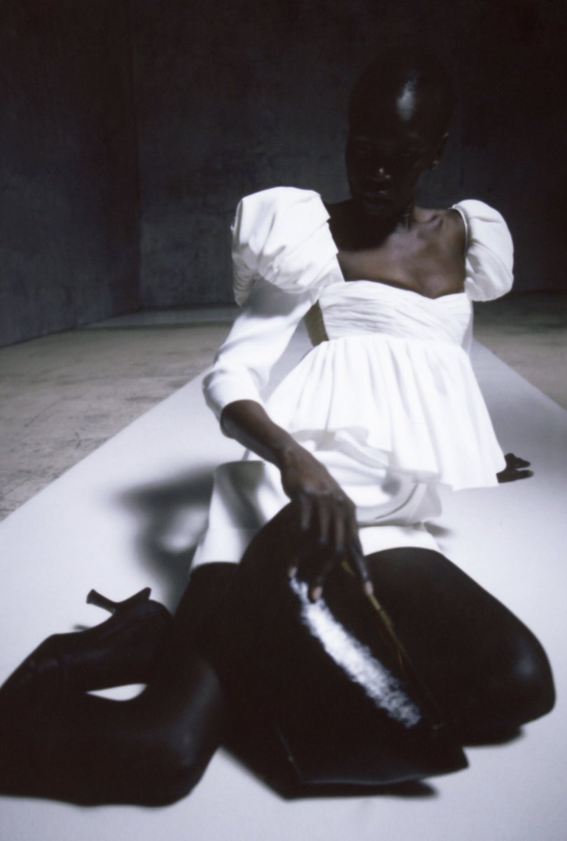 musematter's tweet photo. Alek Wek in Khaite S/S2021 photographed by Hanna Tvette, styled by Vanessa Traina, and makeup by Cyndle Komarovski https://t.co/QLTZSwMkRu