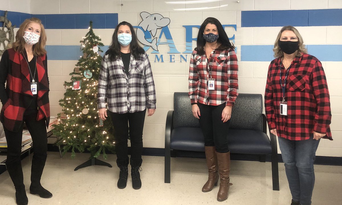 DareDolphins's tweet photo. Flannel or Frost?! You decide! Either one works for spirit day! #12daysoffun #holidaycheer #beststaffever https://t.co/7aHfLIQnqJ