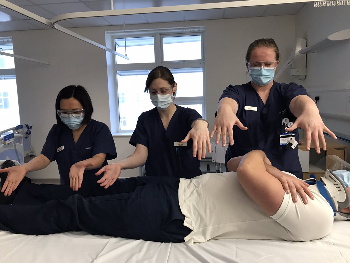 4. Team of three roll the body. Positioned in height order with tallest at the head end so they are able to reach across the patient’s shoulders. We use a three hand over, three hands under technique.