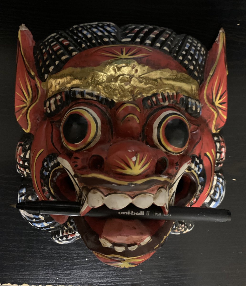 Oh.Oooooooh.My Thai demon mask that I’d hung there with a pen in its mouth to remind me to stay in there until my word goals were met.Because I never closed myself into her room, I’d forgotten it was on the back of the door *the whole time.*Her monster was REAL.