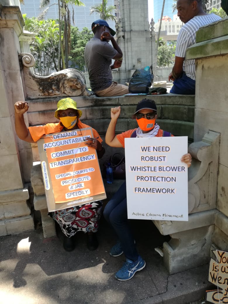 KathradaFound's tweet photo. Action on International Anti-Corruption Day, Durban.
#OrangeOveralls
#standuptocorruption
#RecoverWithIntegrity https://t.co/Up99xwHSJn