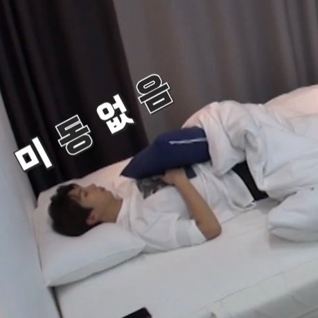 when he sleeps he likes to have a pillow on top of him.