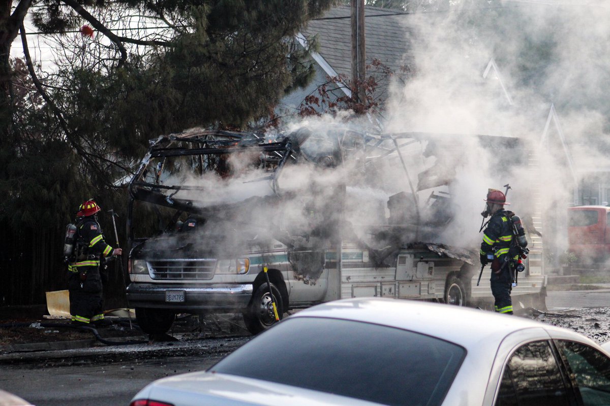 SCF_Alerts's tweet photo. Modesto Firefighters battle a fully involved RV near the intersection of 14th and E Street in Downtown Modesto this afternoon #modestofire https://t.co/7b2Jod26NW