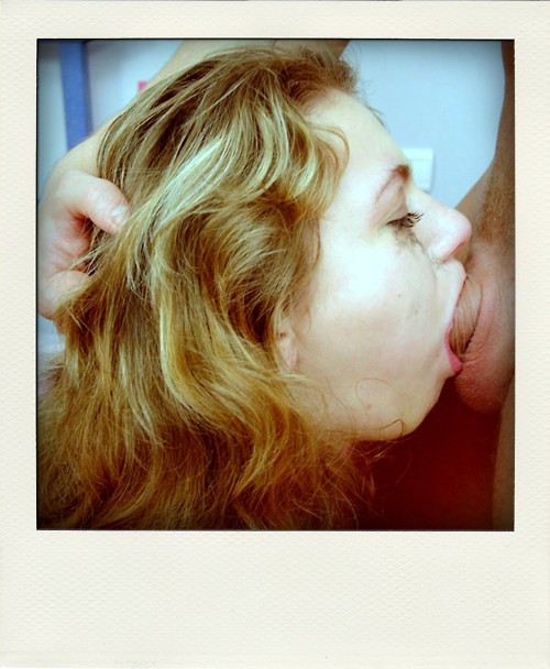 A polaroid of a student slobbering on her schlong.