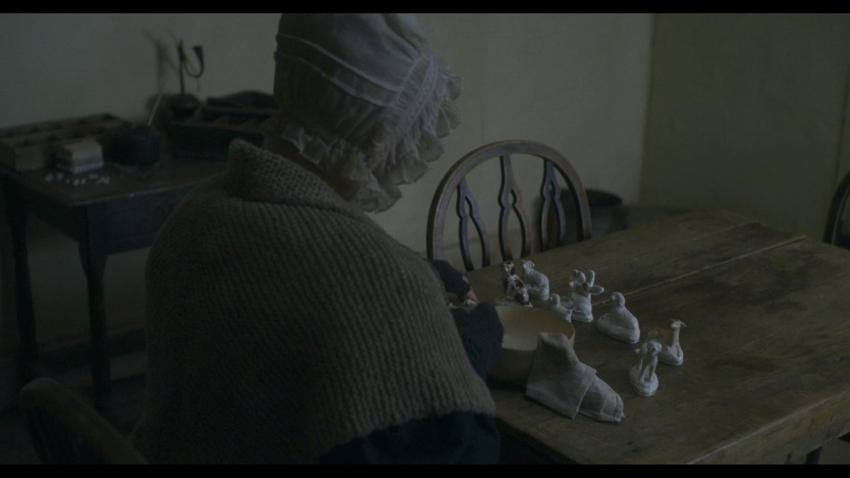 In  #Ammonite, Mary Anning's elderly mother, Molly, always cleans her porcelain figurines. Francis Lee  @strawhousefilms on the symbolism:The film is about "loss and loneliness." Molly lost 8 babies. The figurines were "the physical manifestation of her loss of those children."